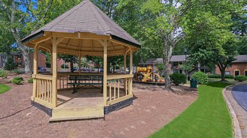 space for recreation of children with green trees providing shade.